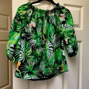 Whbm never worn before along with tags attached. It’s an off the shoulders